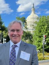 Daniel Grimm poses infront of the capital building